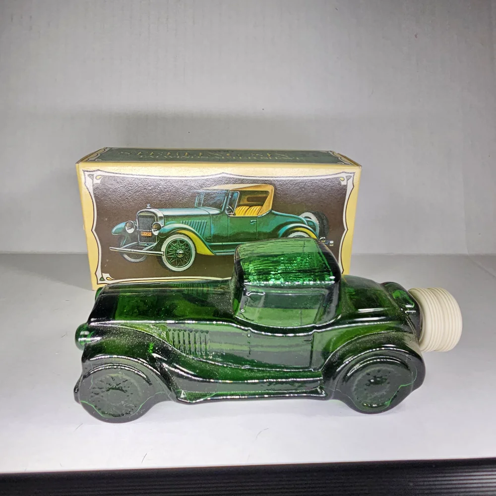 Avon Sterling Six II Green Glass Car Bottle